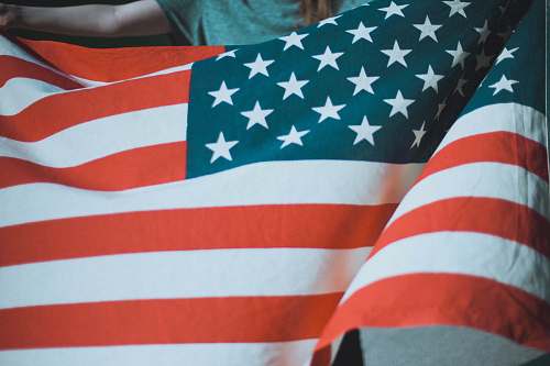 american flag person holding USA flag woman